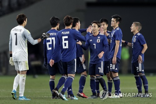 ▲ 12일 중국과의 E-1 챔피언십 2차전 승리를 자축하는 일본 대표팀