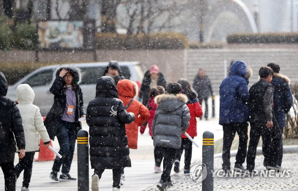 ▲ 눈발 날리는 서울 도심 모습