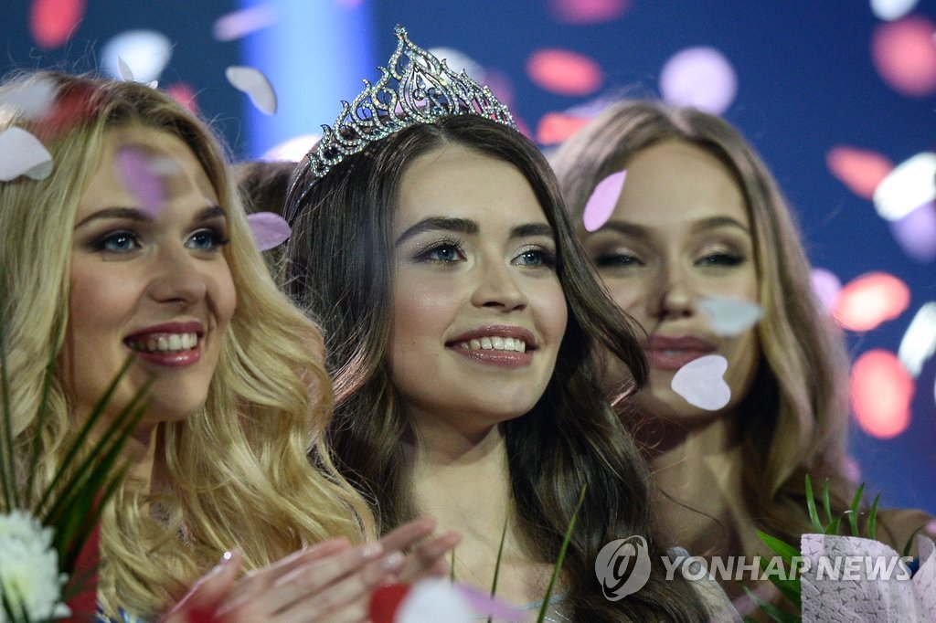 Maria Vasilevich smiles after being crowned Miss Belarus 2018 in Minsk on May 4, 2018.