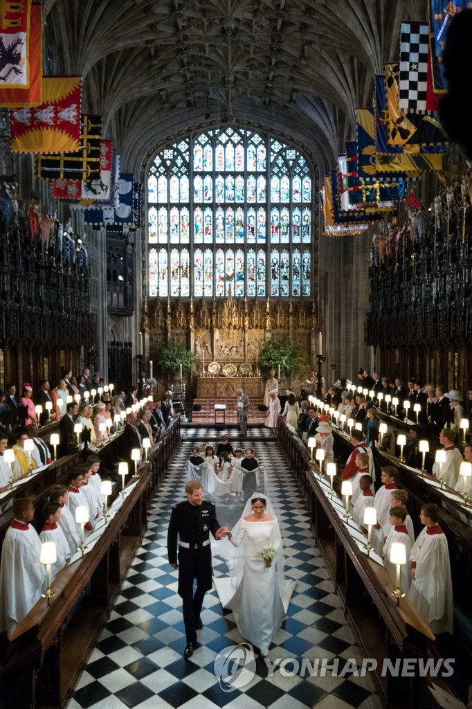 ▲ Prince Harry and Meghan Markle leave St George's Chapel at Windsor Castle after their wedding in Windsor, Britain, May 19, 2018. Jonathan Brady/Pool via REUTERS TPX IMAGES OF THE DAY