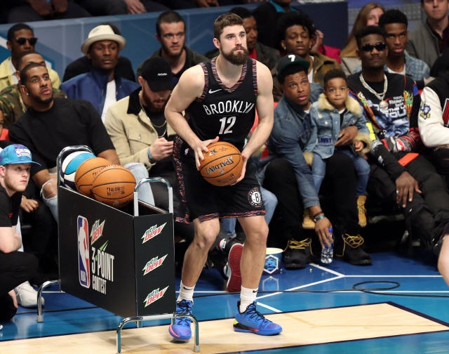 ▲ Feb 16, 2019; Charlotte, NC, USA; Brooklyn Nets forward Joe Harris competes in the 3-Point Contest during the NBA All-Star Saturday Night at Spectrum Center. Mandatory Credit: Jim Dedmon-USA TODAY Sports