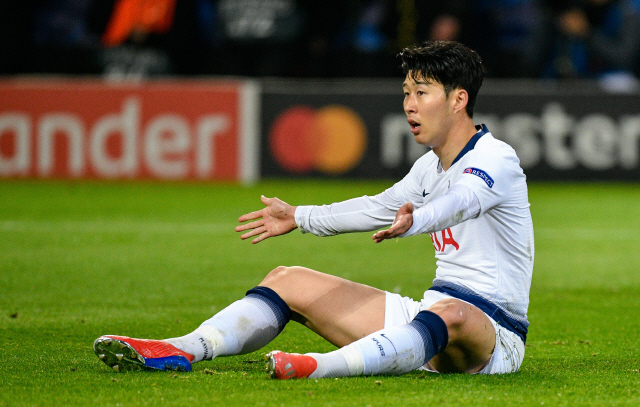▲ Tottenham Hotspur‘s South Korean striker Son Heung-Min sits on the ground during the UEFA Champions League round of 16 second leg football match between BVB Borussia Dortmund and Tottenham Hotspur on March 5, 2019 in Dortmund, western Germany. (Photo by SASCHA SCHUERMANN / AFP)