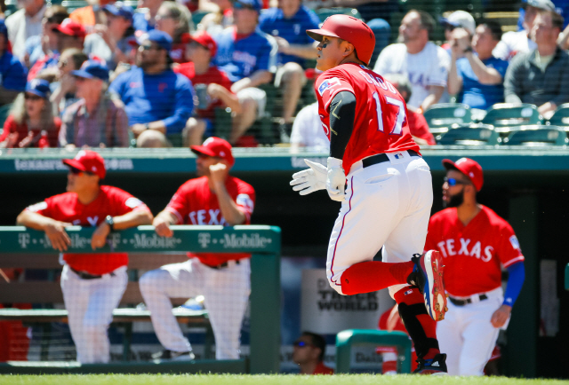 ▲ Apr 21, 2019; Arlington, TX, USA; Texas Rangers right fielder Shin-Soo Choo (17) runs down the first base line after hitting a double against the Houston Astros during the first inning at Globe Life Park in Arlington. Mandatory Credit: Ray Carlin-USA TODAY Sports