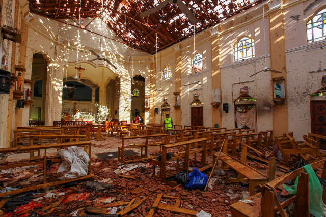 ▲ Sri Lankan soldiers look on inside the St Sebastian‘s Church at Negombo on April 21, 2019, following a bomb blast during the Easter service that killed worshippers. A series of eight devastating bomb blasts ripped through high-end hotels and churches holding Easter services in Sri Lanka on April 21, killing nearly  200 people, including dozens of foreigners.      Photo by Perera Sameera/UPI