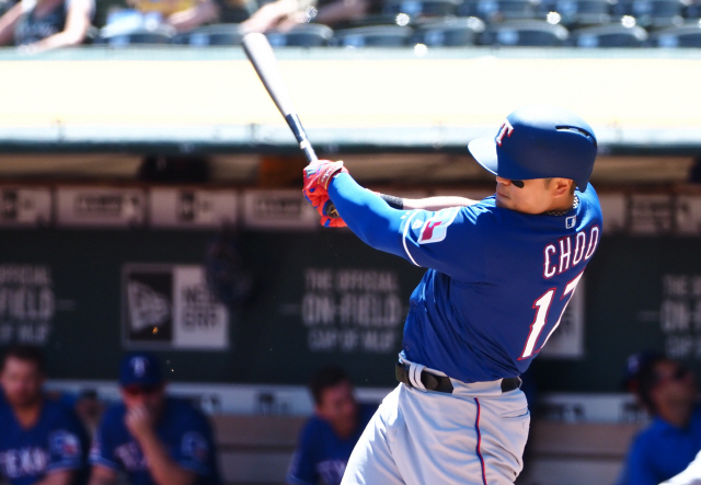 ▲ Apr 24, 2019; Oakland, CA, USA; Texas Rangers left fielder Shin-Soo Choo (17) hits a single against the Oakland Athletics during the first inning at Oakland Coliseum. Mandatory Credit: Kelley L Cox-USA TODAY Sports