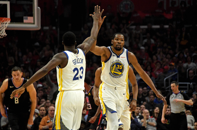 ▲ Apr 26, 2019; Los Angeles, CA, USA; Golden State Warriors forward Kevin Durant (35) celebrates with forward Draymond Green (23) against the LA Clippers in the first half of game six of the first round of the 2019 NBA Playoffs  at Staples Center. Mandatory Credit: Kirby Lee-USA TODAY Sports
