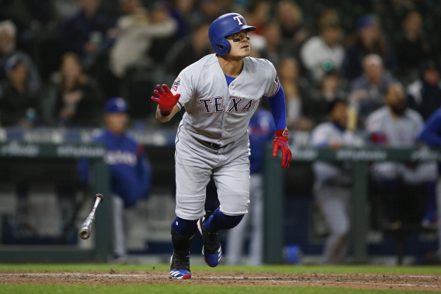 ▲ Apr 26, 2019; Seattle, WA, USA; Texas Rangers pinch hitter Shin-Soo Choo (17) drops his bat after hitting the game tying solo home run against the Seattle Mariners during the ninth inning at T-Mobile Park. Mandatory Credit: Jennifer Buchanan-USA TODAY Sports