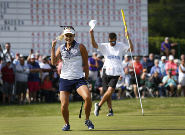 ▲ Lexi Thompson celebrates after making a putt for an eagle at the 18th hole to 
win the LPGA Classic golf tournament, Sunday, June 9, 2019, in Galloway, NJ. (AP Photo/Noah K. Murray)