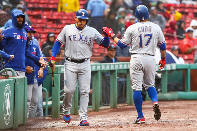 ▲ BOSTON, MA - JUNE 13: Shin-Soo Choo #17 of the Texas Rangers returns to the dugout after scoring in the Frits inning of a game against the Boston Red Sox at Fenway Park on June 13, 2019 in Boston, Massachusetts.   Adam Glanzman/Getty Images/AFP