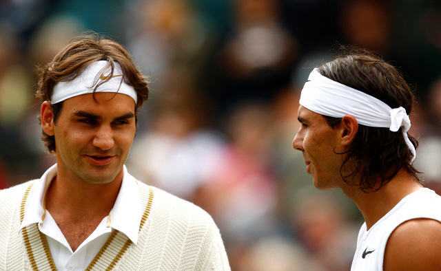 ▲ FILE PHOTO: Tennis - Wimbledon - All England Lawn Tennis &amp; Croquet Club, Wimbledon, England - 6/7/08   Switzerland‘s Roger Federer and Spain’s Rafael Nadal at the Men‘s Singles Final   Mandatory Credit: Action Images / Jason O’Brien/File Photo    <All rights reserved by Yonhap News Agency>