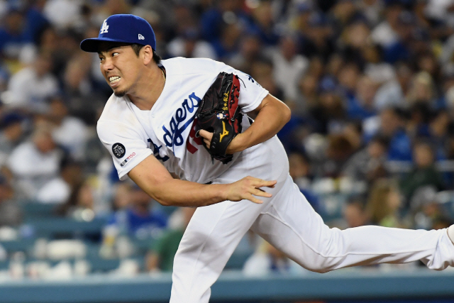 ▲ Jul 19, 2019; Los Angeles, CA, USA; Los Angeles Dodgers pitcher Kenta Maeda (18) pitches against the Miami Marlins in the eighth inning at Dodger Stadium. Mandatory Credit: Richard Mackson-USA TODAY Sports