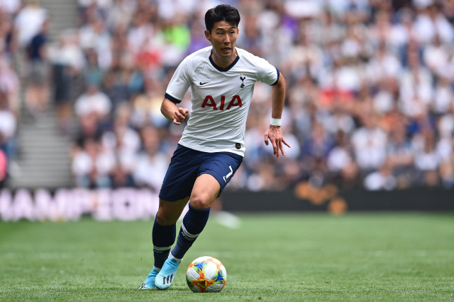 ▲ Tottenham Hotspur‘s South Korean striker Son Heung-Min runs with the ball during the 2019 International Champions Cup football match between Tottenham Hotspur and Inter Milan at Tottenham Hotspur Stadium in London on August 4, 2019. (Photo by Glyn KIRK / AFP)