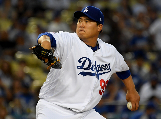 ▲ Sep 4, 2019; Los Angeles, CA, USA; Los Angeles Dodgers starting pitcher Hyun-Jin Ryu (99) pitches in the first inning of the game against the Colorado Rockies at Dodger Stadium. Mandatory Credit: Jayne Kamin-Oncea-USA TODAY Sports