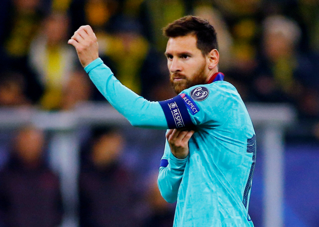 ▲ Soccer Football - Champions League - Group F - Borussia Dortmund v FC Barcelona - Signal Iduna Park, Dortmund, Germany - September 17, 2019  Barcelona‘s Lionel Messi with the captain’s armband after coming on as a substitute  REUTERS/Thilo Schmuelgen