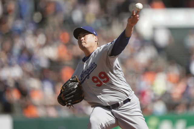 ▲ Sep 28, 2019; San Francisco, CA, USA; Los Angeles Dodgers starting pitcher Hyun-Jin Ryu (99) pitches against the San Francisco Giants during the first inning at Oracle Park. Mandatory Credit: Stan Szeto-USA TODAY Sports