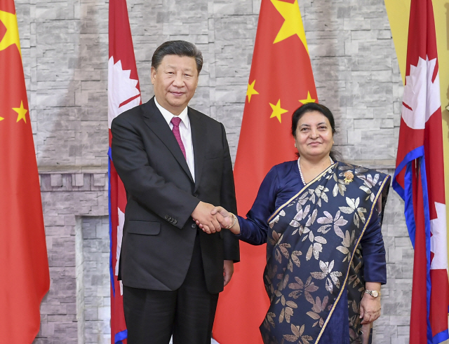 ▲ (191012) -- KATHMANDU, Oct. 12, 2019 (Xinhua) -- Chinese President Xi Jinping meets with Nepali President Bidya Devi Bhandari in Kathmandu, Nepal, Oct. 12, 2019. (Xinhua/Xie Huanchi)    <All rights reserved by Yonhap News Agency>