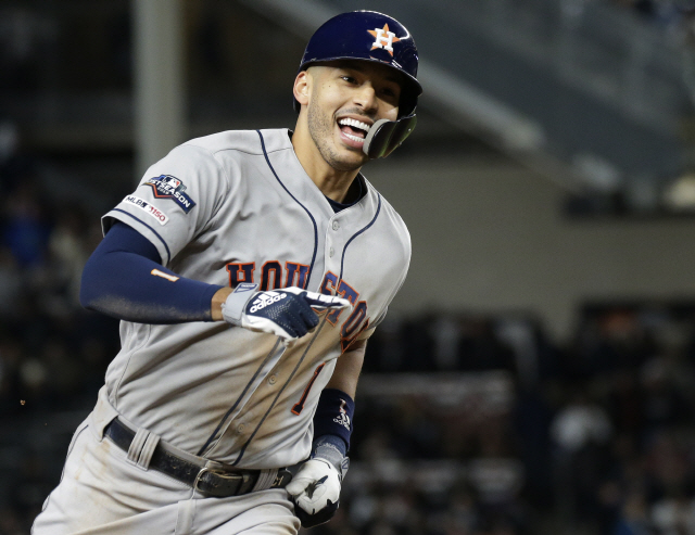 ▲ Houston Astros Carlos Correa rounds the bases after hitting a three-run home run in the sixth inning of Game 4 of the American League Championship Series against the New York Yankees in the 2019 MLB Playoffs at Yankee Stadium in New York City on Thursday, October 17, 2019.  Photo by John Angelillo/UPI