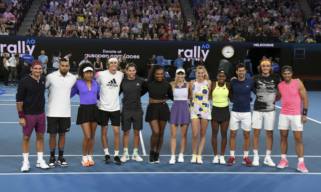 ▲ The world&lsquo;s top tennis players pose for a photo in the Rally for Relief charity tennis match in support of the victims of the Australian bushfires, in Melbourne of January 15, 2020, ahead of the Australian Open tennis tournament. (Photo by WILLIAM WEST / AFP) / -- IMAGE RESTRICTED TO EDITORIAL USE - STRICTLY NO COMMERCIAL USE --
&lt;All rights reserved by Yonhap News Agency&gt;