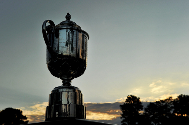 ▲ (FILES) In this file photo taken on August 11, the Wanamaker Trophy is seen as the sun rises during the first round of the 93rd PGA Championship at the Atlanta Athletic Club in Johns Creek, Georgia. - The US PGA Championship, scheduled for May 14-17 at Harding Park in San Francisco, has been postponed, the second 2020 major golf championship to be derailed by the coronavirus pandemic. The PGA of America said on March 17, 2020, they hoped to reschedule the event at Harding Park later in the year. (Photo by STUART FRANKLIN / GETTY IMAGES NORTH AMERICA / AFP)